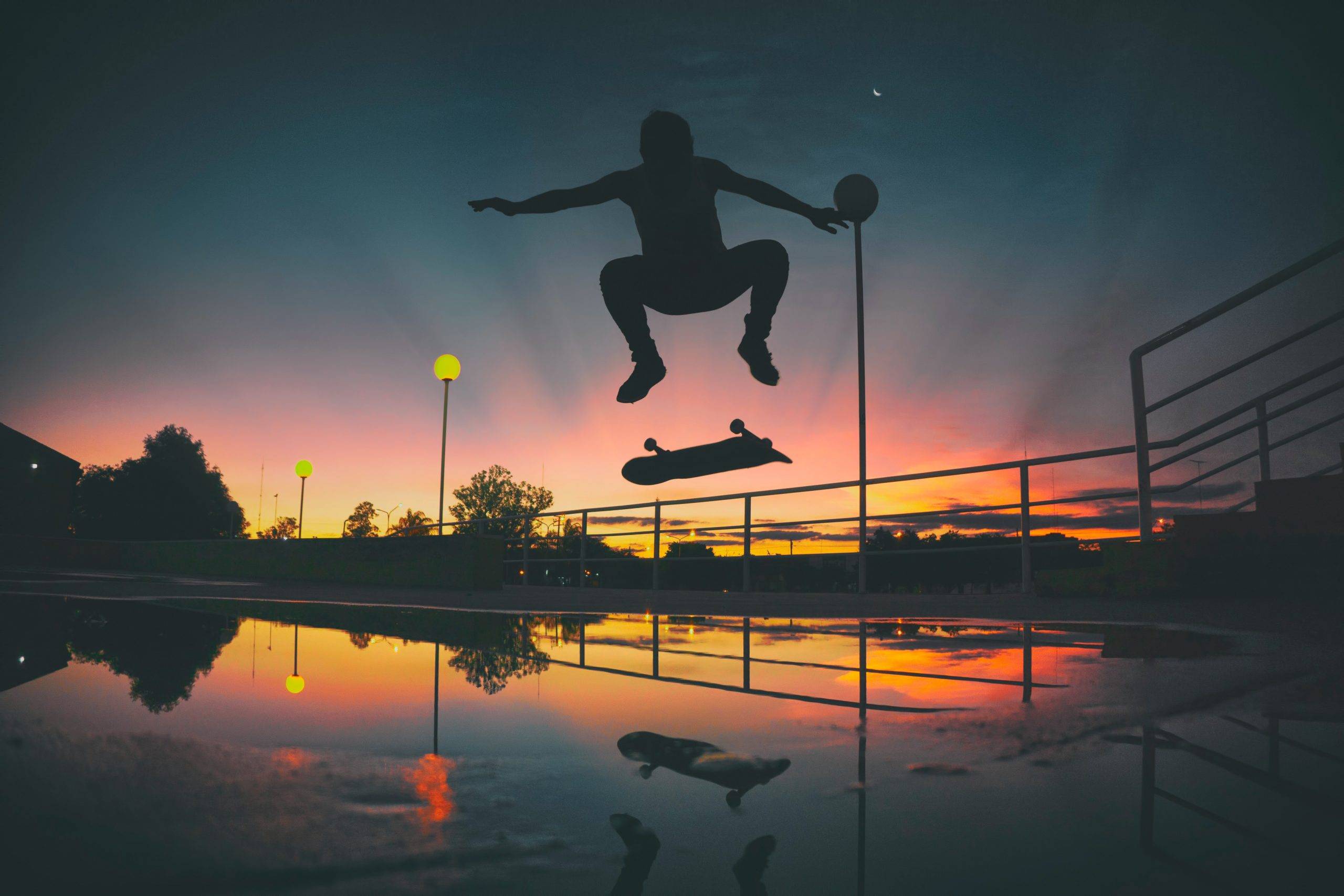 Stop Being Afraid of Change and Uncertainty - man skateboarding at sunset