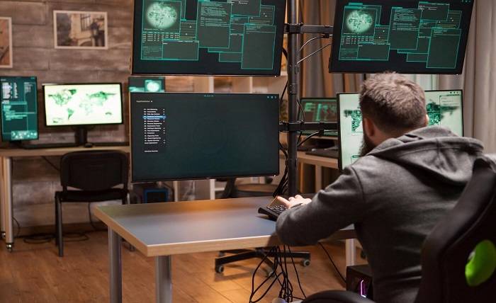 The Role of Next-Generation Firewalls in Modern Cybersecurity shot from back dangerous hacker making dangerous virus identity theft 482257 34244